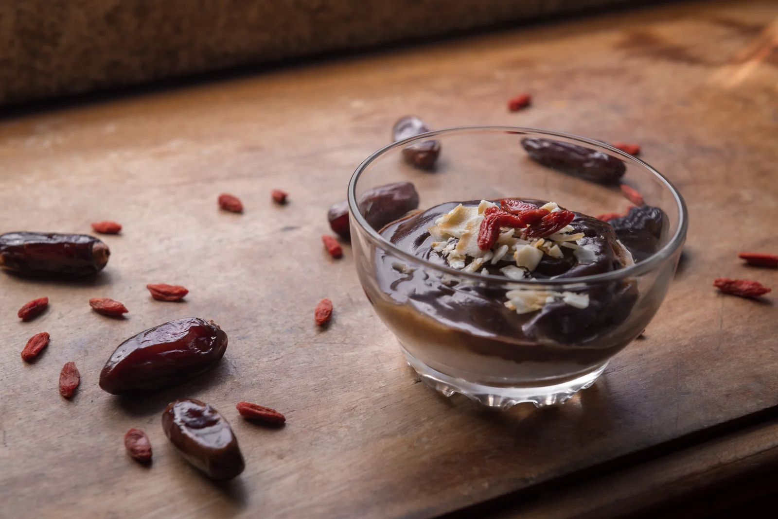 Chocolate dessert with dried fruit and toppings.