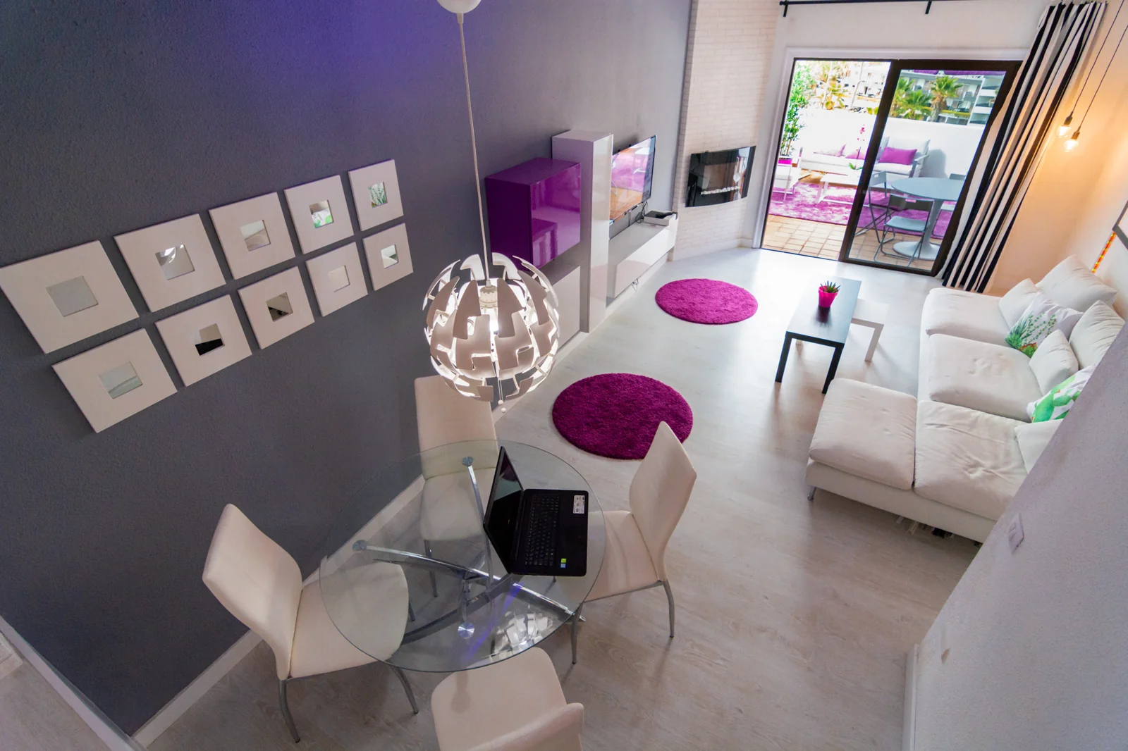 Overhead view of a modern living and dining room.
