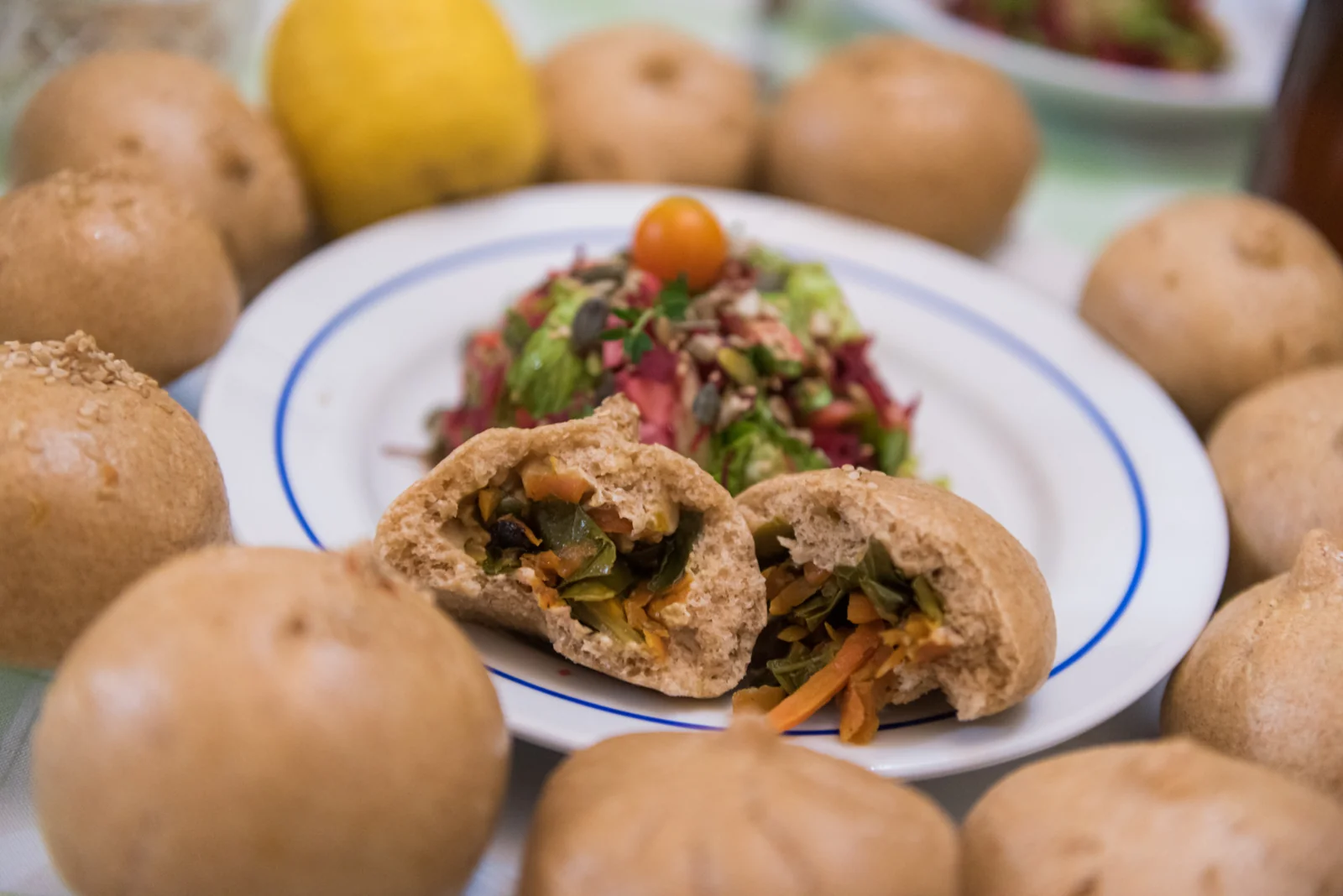 Savory plated food surrounded by potatoes.