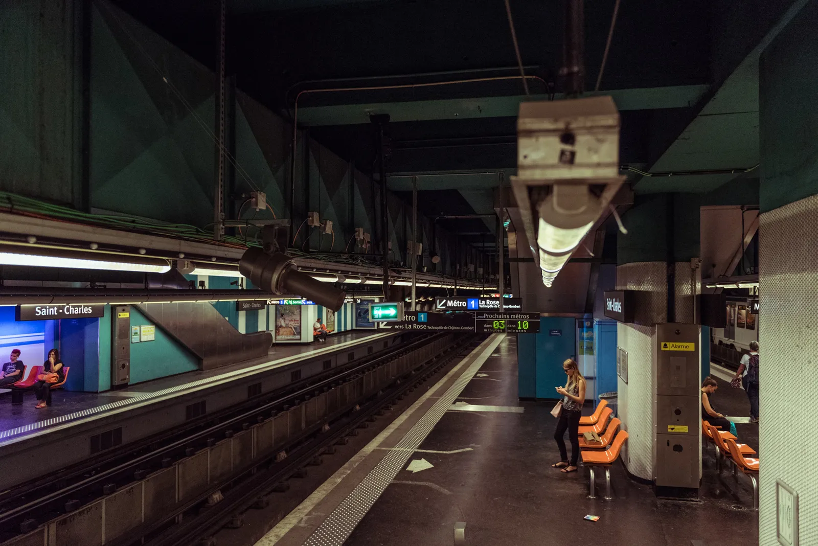 Passengers waiting on an underground train platform